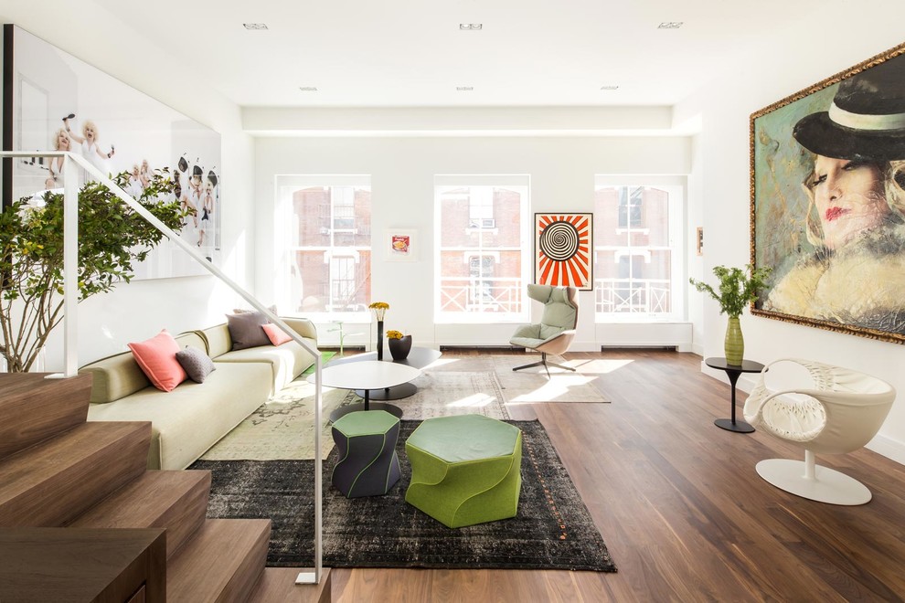 Trendy formal medium tone wood floor and brown floor living room photo in New York with white walls, no fireplace and no tv