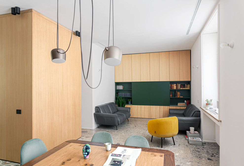 Foto di un ampio soggiorno minimalista aperto con libreria, pareti bianche, pavimento in marmo e pavimento grigio