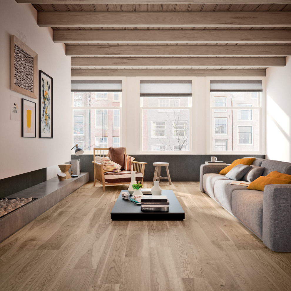 Ispirazione per un soggiorno design con pavimento in gres porcellanato