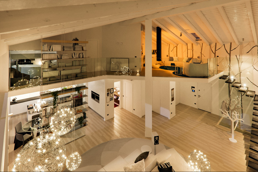 Foto de salón contemporáneo extra grande con paredes blancas y suelo de madera clara