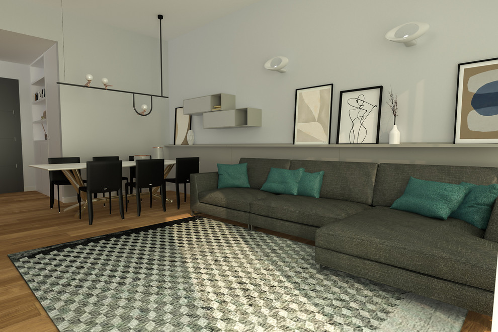 Immagine di un soggiorno minimal di medie dimensioni e aperto con pareti beige e parquet chiaro