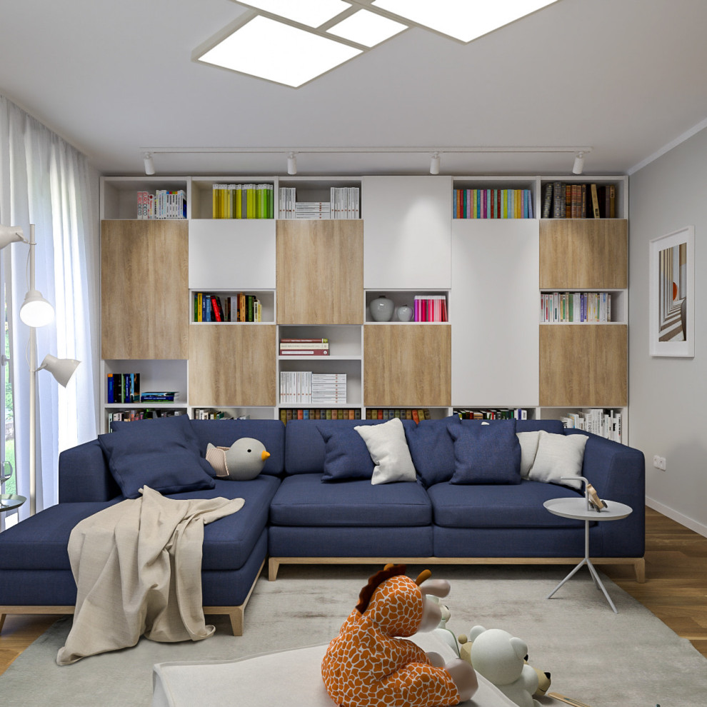 Diseño de salón abierto contemporáneo de tamaño medio con paredes multicolor y suelo de madera clara