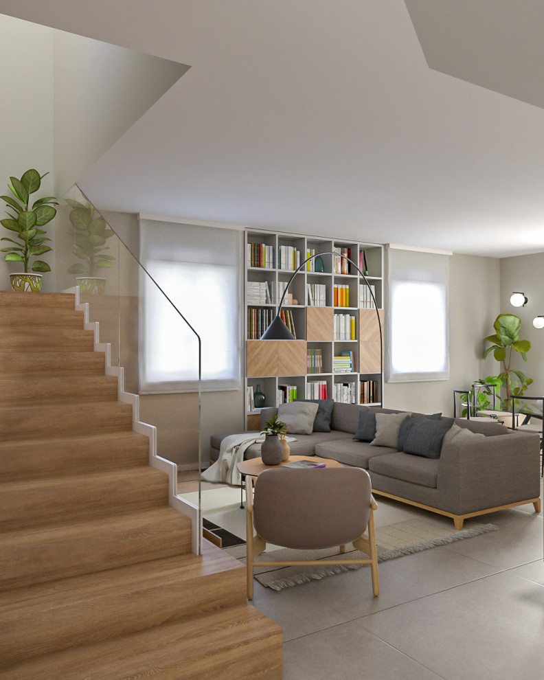 Idee per un soggiorno minimal di medie dimensioni e aperto con libreria, pareti multicolore, pavimento in gres porcellanato, parete attrezzata e pavimento grigio
