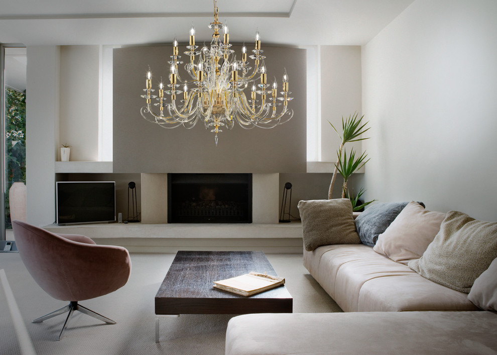 Example of a trendy living room design in Bari with white walls, a standard fireplace and a plaster fireplace
