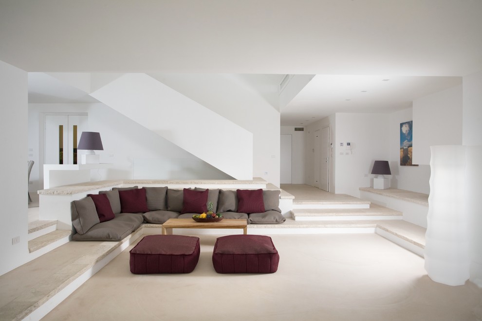 Design ideas for a contemporary living room in Bari with white walls.