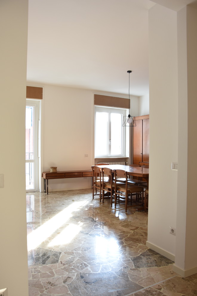 Ispirazione per un soggiorno minimalista con pavimento in marmo e pavimento grigio