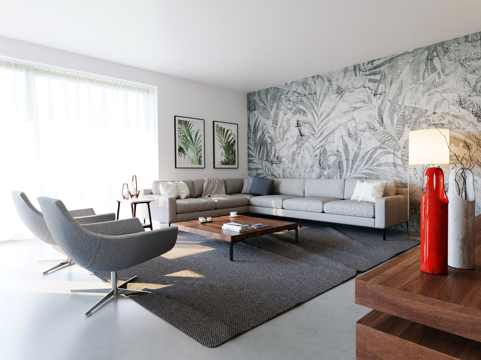 Cette image montre un salon minimaliste de taille moyenne et ouvert avec un mur blanc, sol en béton ciré, un téléviseur encastré et un sol gris.
