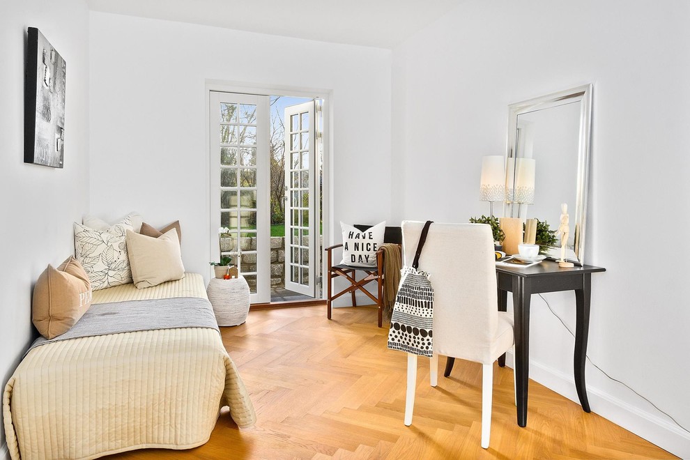 Example of a transitional bedroom design in Copenhagen
