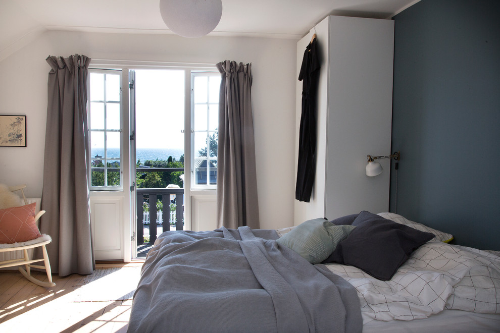 コペンハーゲンにある北欧スタイルのおしゃれな寝室のインテリア