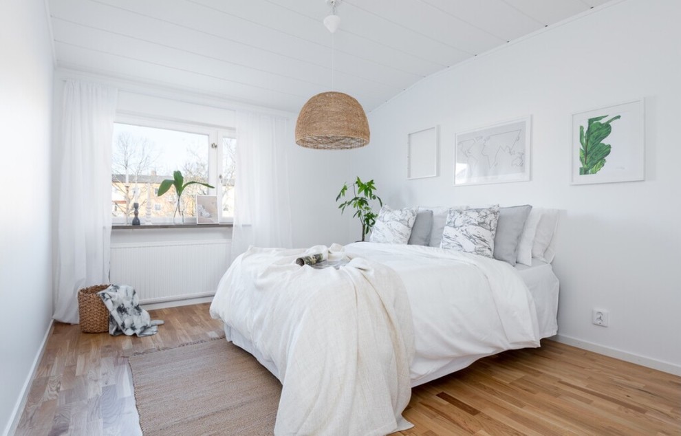Skandinavisk inredning av ett sovrum