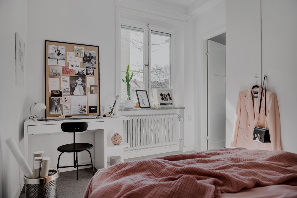 Ejemplo de dormitorio principal escandinavo de tamaño medio