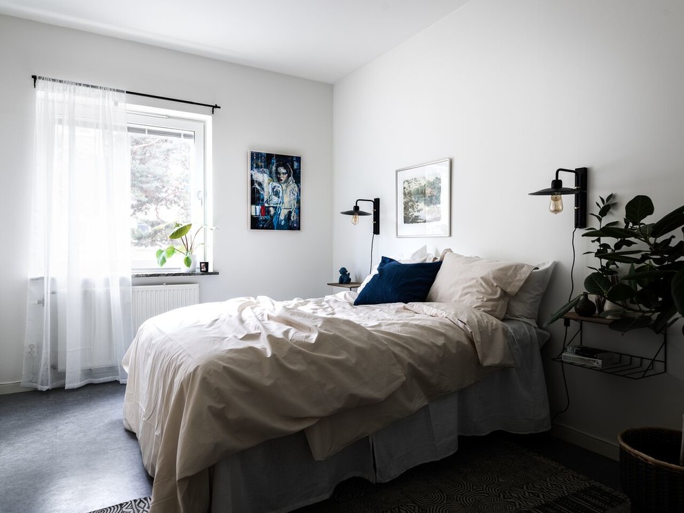 Idéer för mellanstora minimalistiska sovrum, med vita väggar, linoleumgolv och grått golv