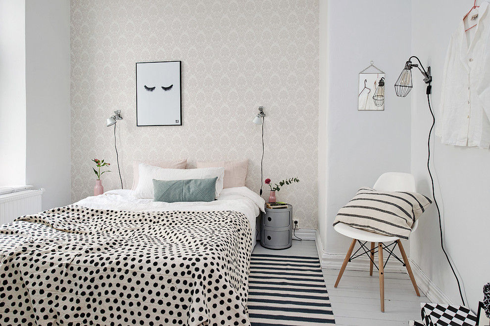Bedroom - mid-sized scandinavian master painted wood floor bedroom idea in Gothenburg with white walls and no fireplace