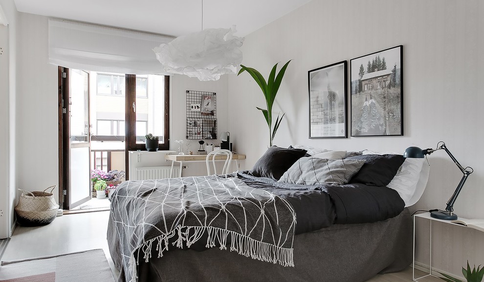 Scandi bedroom in Stockholm with beige walls.