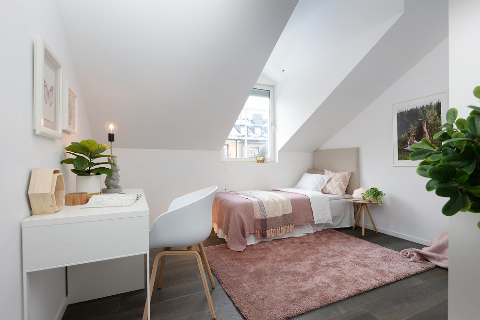 Inspiration for a mid-sized scandinavian dark wood floor and brown floor bedroom remodel in Stockholm with white walls and no fireplace