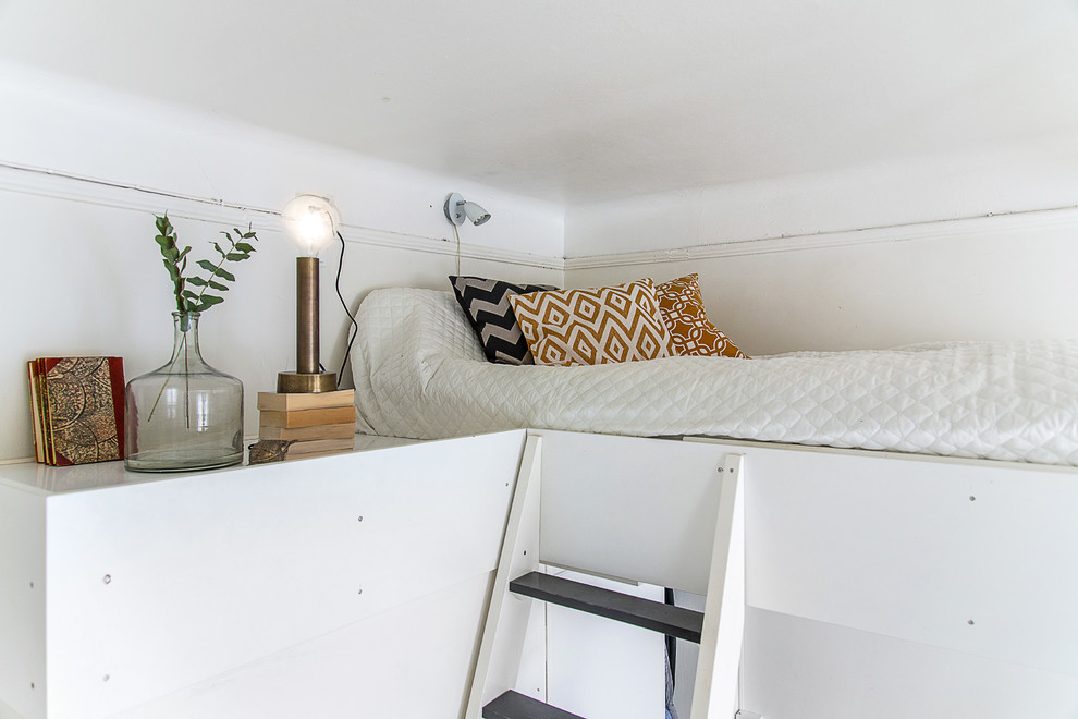 Esempio di una piccola camera da letto stile loft classica
