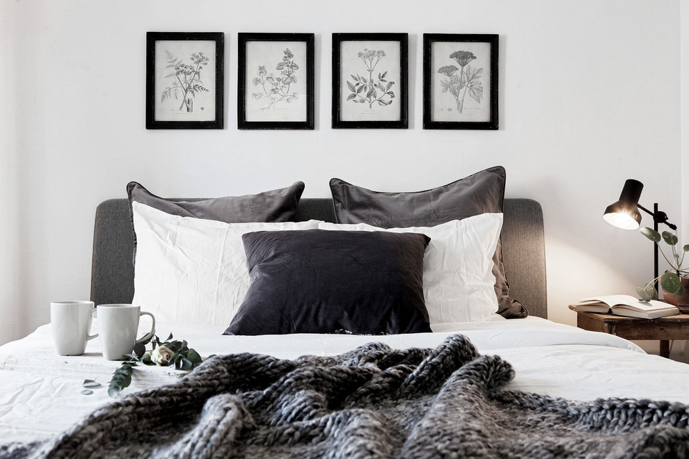 Foto på ett minimalistiskt sovrum