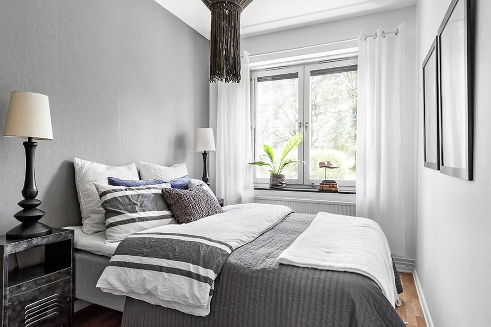 Idéer för skandinaviska sovrum, med grå väggar