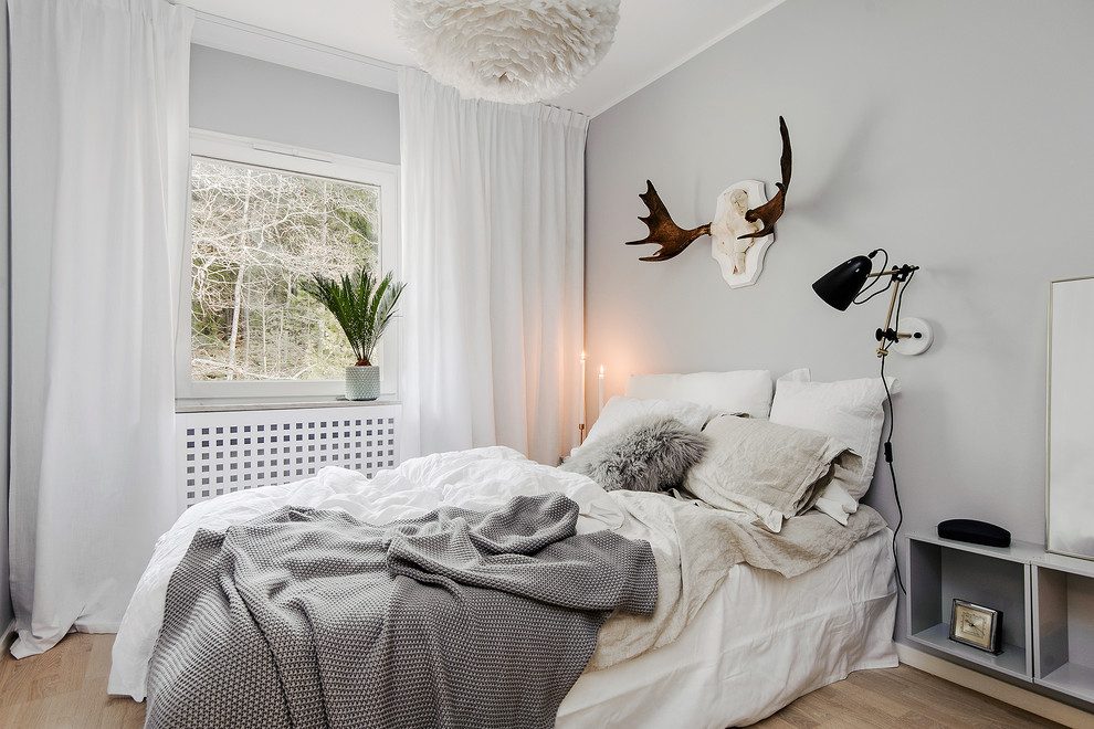 ストックホルムにある北欧スタイルのおしゃれな寝室のインテリア