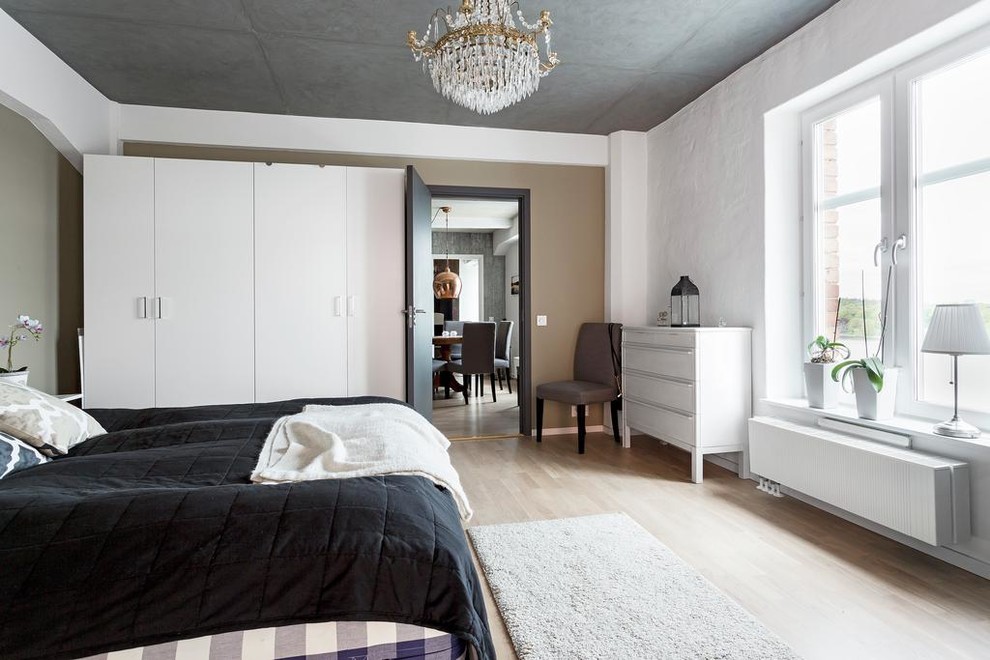 Inspiration for an industrial bedroom remodel in Stockholm