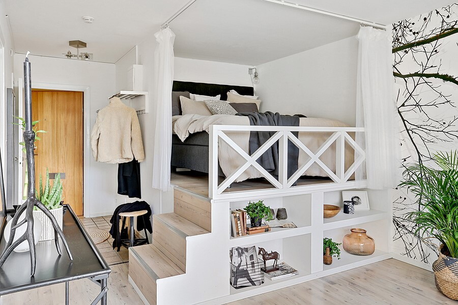 Inspiration for a small scandinavian bedroom in Gothenburg with white walls, light hardwood flooring and beige floors.