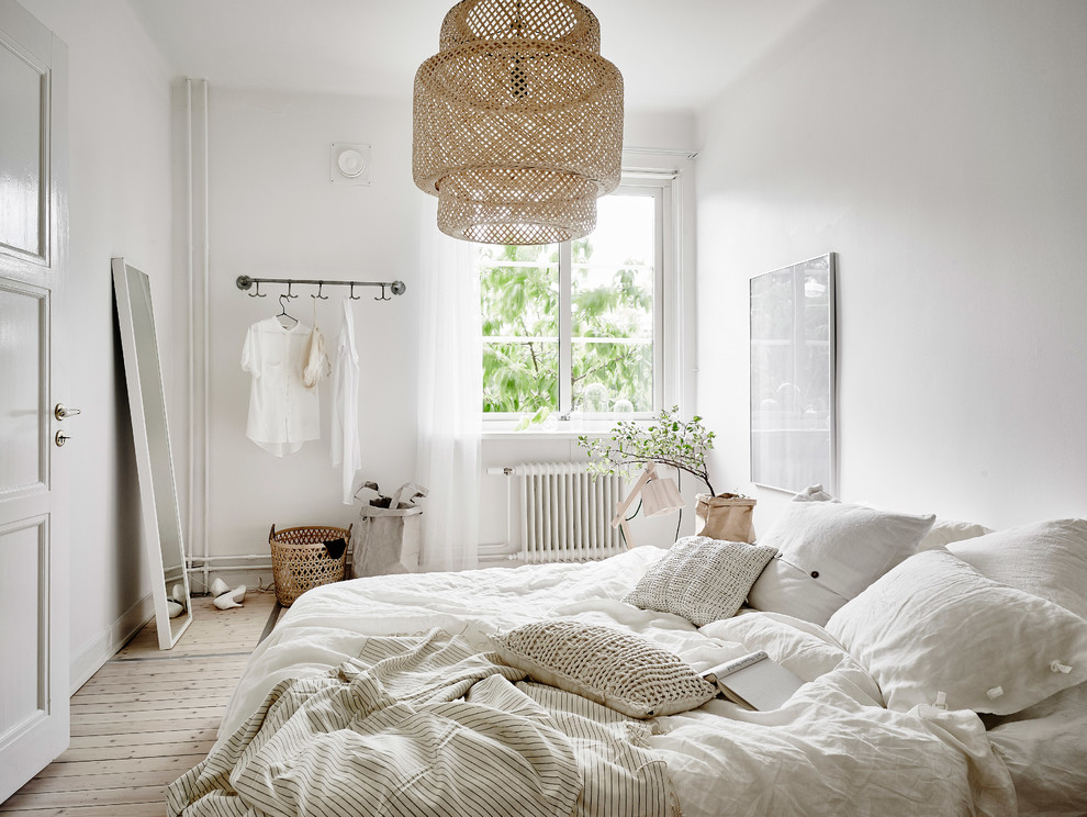 Bedroom - scandinavian bedroom idea in Gothenburg with white walls