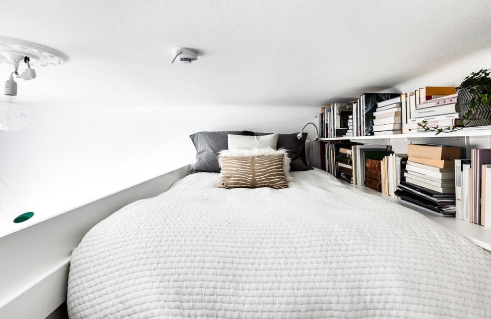 Inredning av ett minimalistiskt litet sovrum