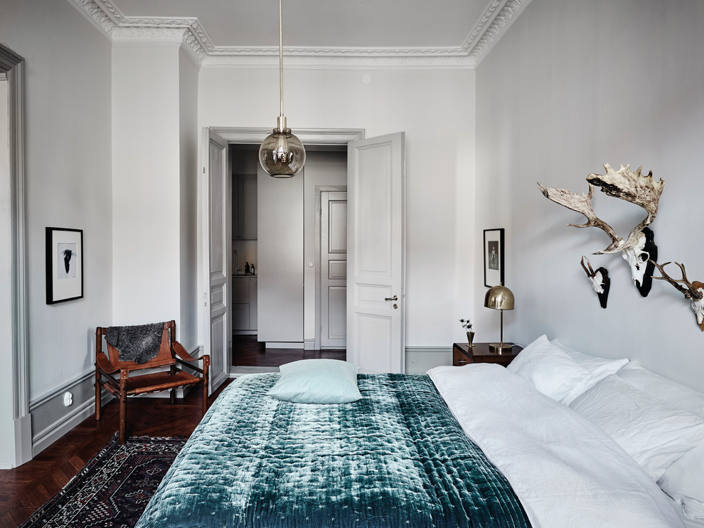 Inspiration for a medium sized victorian master bedroom in Gothenburg with grey walls and dark hardwood flooring.