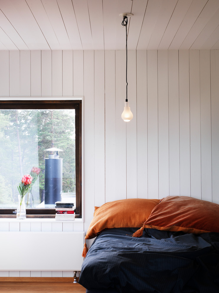 ストックホルムにある北欧スタイルのおしゃれな寝室のレイアウト
