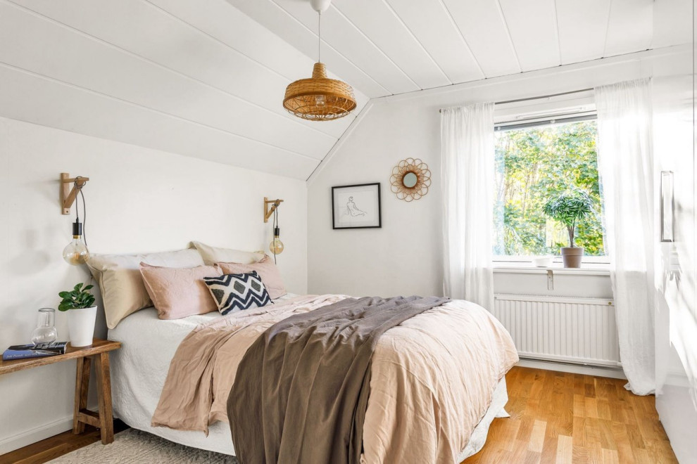 This is an example of a scandi bedroom in Stockholm.