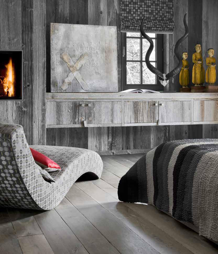 Idee per una camera da letto rustica con pareti in legno