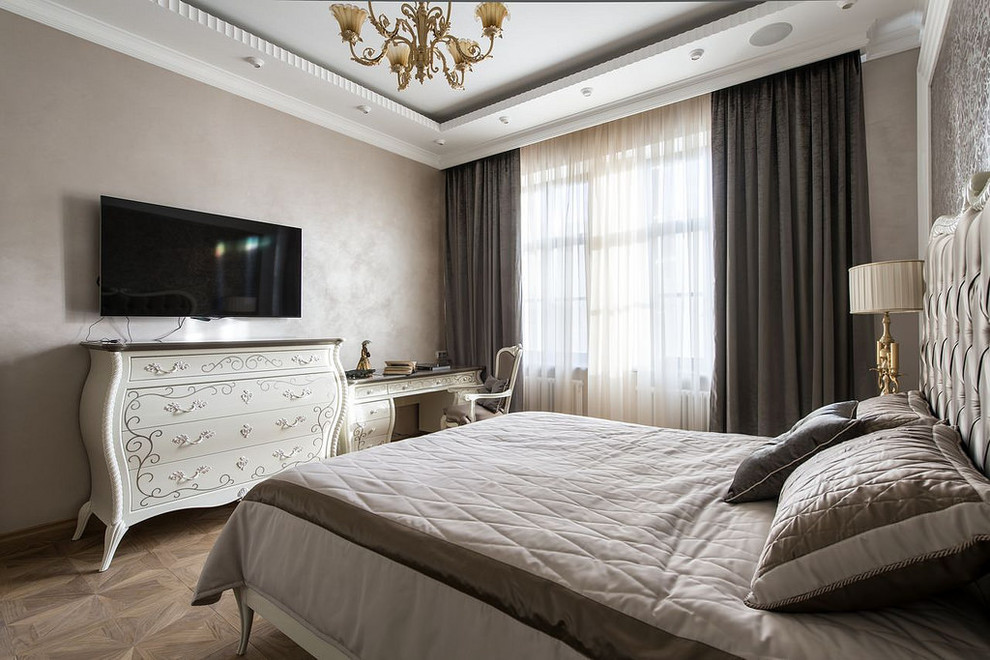Photo of a large traditional master bedroom in Moscow with brown walls, medium hardwood flooring and brown floors.