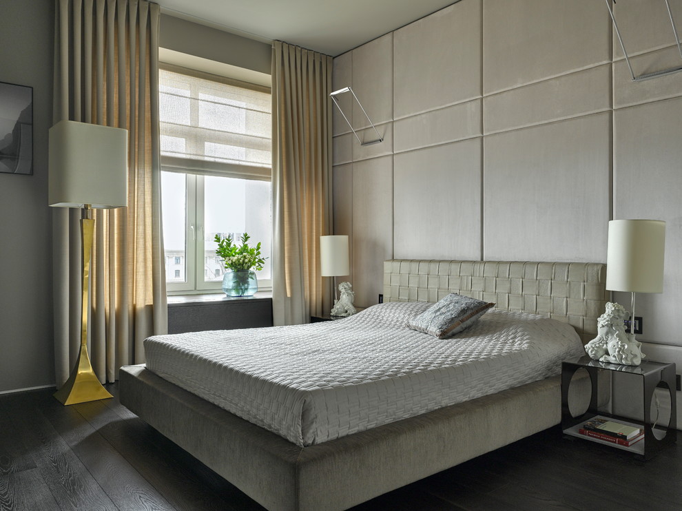 Photo of a contemporary master bedroom in Saint Petersburg with grey walls, dark hardwood flooring and brown floors.