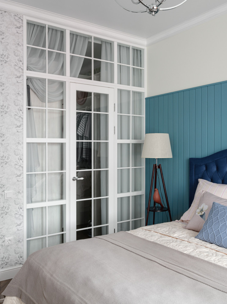 Inspiration for a contemporary master bedroom remodel in Other with blue walls
