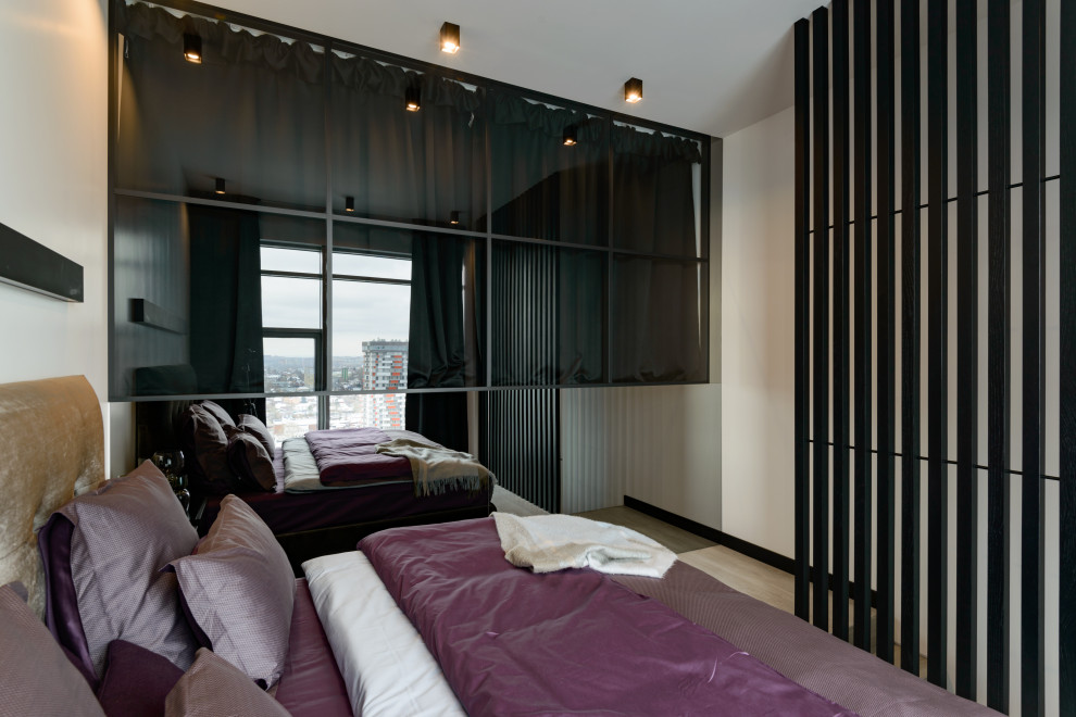 Diseño de dormitorio principal actual grande con paredes blancas, suelo vinílico y suelo gris