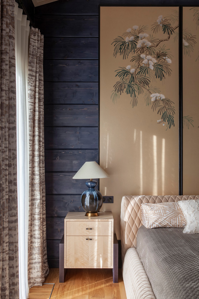 Imagen de habitación de invitados de estilo de casa de campo con paredes azules, machihembrado y madera