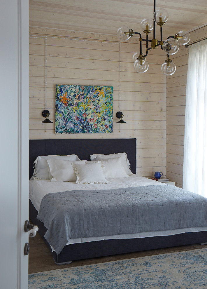 Idee per una camera da letto contemporanea con pareti beige