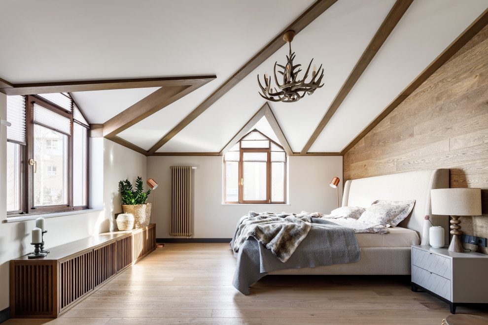 Design ideas for a large country master bedroom in Saint Petersburg with white walls, light hardwood flooring, beige floors and wood walls.