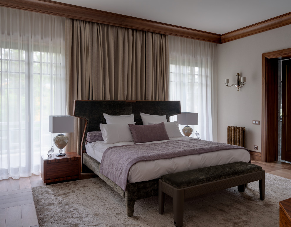 Design ideas for a contemporary bedroom in Moscow with grey walls, medium hardwood flooring and brown floors.