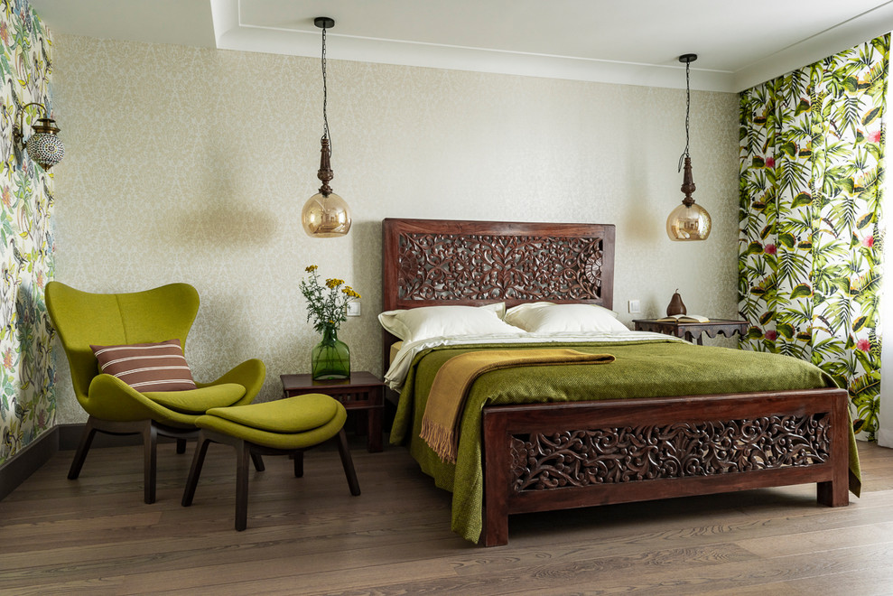 Inspiration for a large eclectic master medium tone wood floor bedroom remodel in Yekaterinburg
