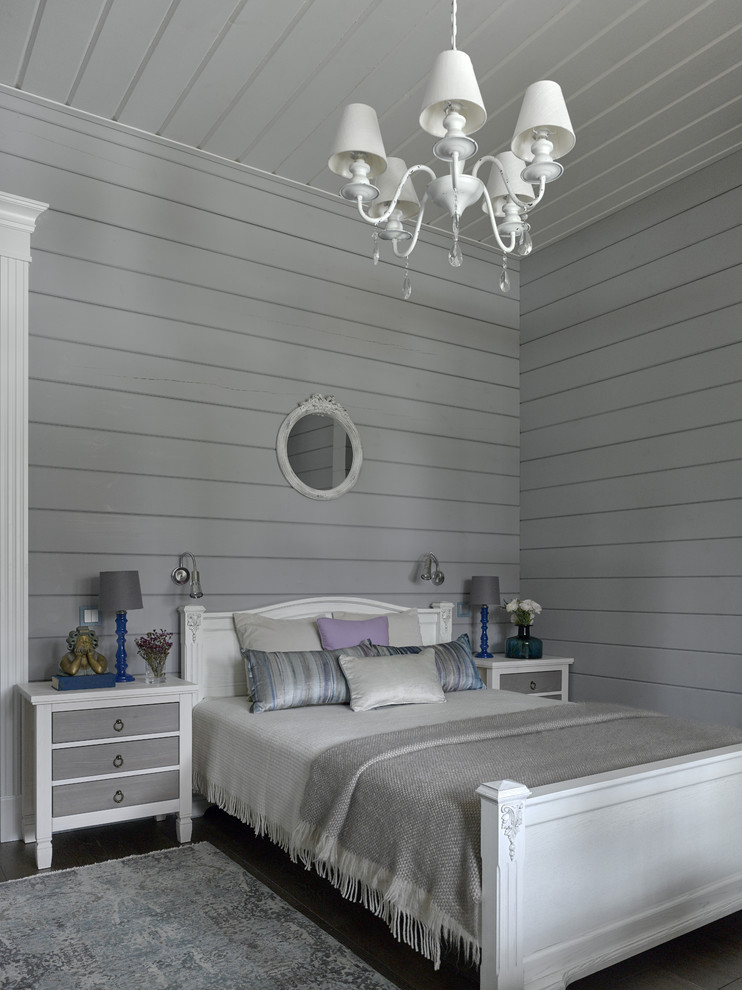 This is an example of a rural guest bedroom in Moscow with grey walls, dark hardwood flooring, brown floors and feature lighting.