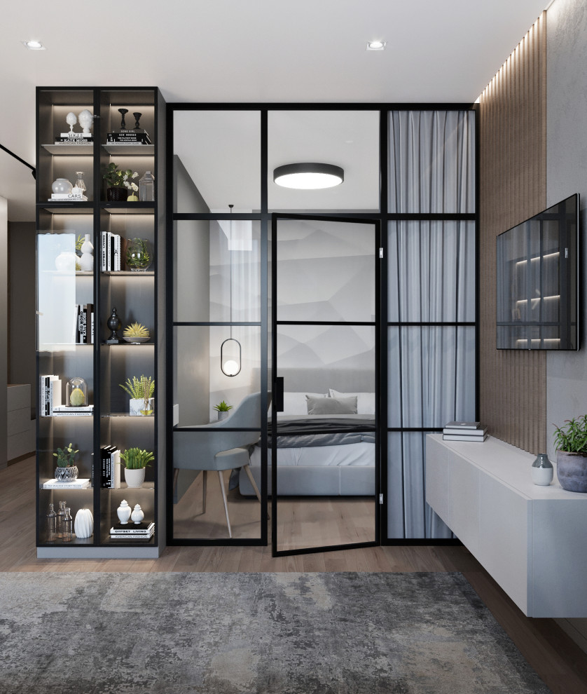 Diseño de dormitorio principal urbano pequeño con paredes grises, suelo laminado y suelo beige