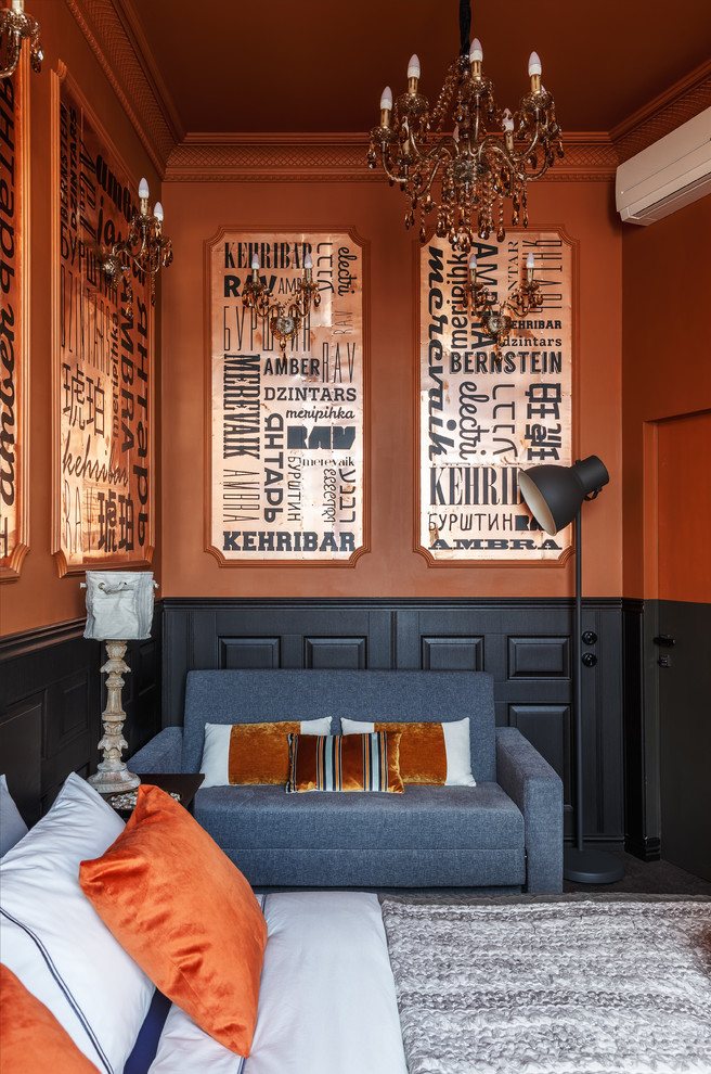 Example of a large eclectic guest bedroom design in Saint Petersburg with orange walls