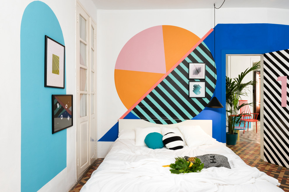Photo of a contemporary master bedroom with multi-coloured walls and multi-coloured floors.