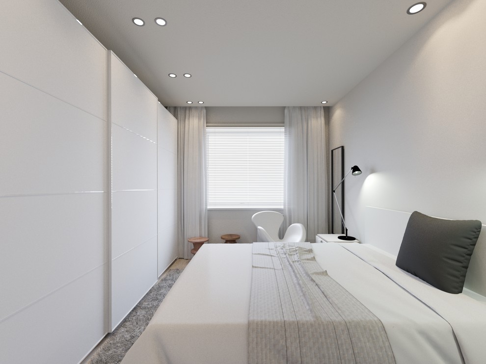 Diseño de dormitorio principal nórdico pequeño con paredes blancas, suelo laminado y suelo gris