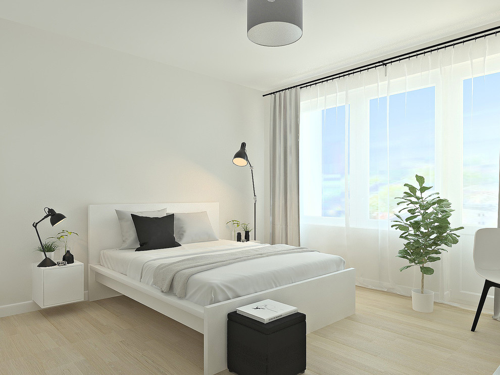 Medium sized scandi master bedroom in Other with white walls, laminate floors and beige floors.
