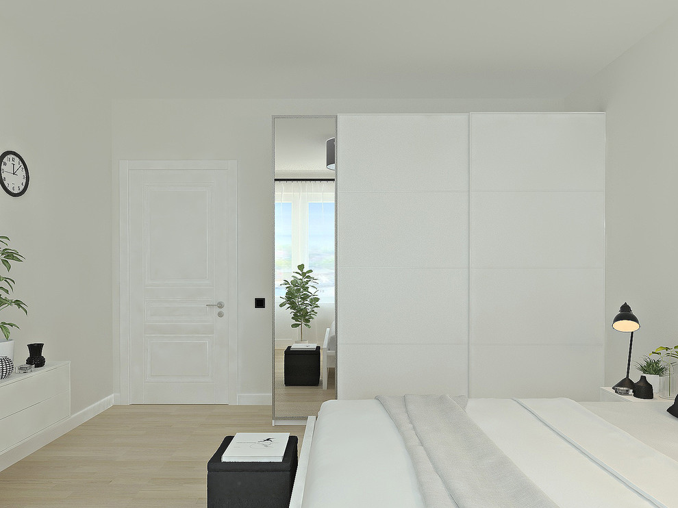 Photo of a medium sized scandinavian master bedroom in Other with white walls, laminate floors and beige floors.