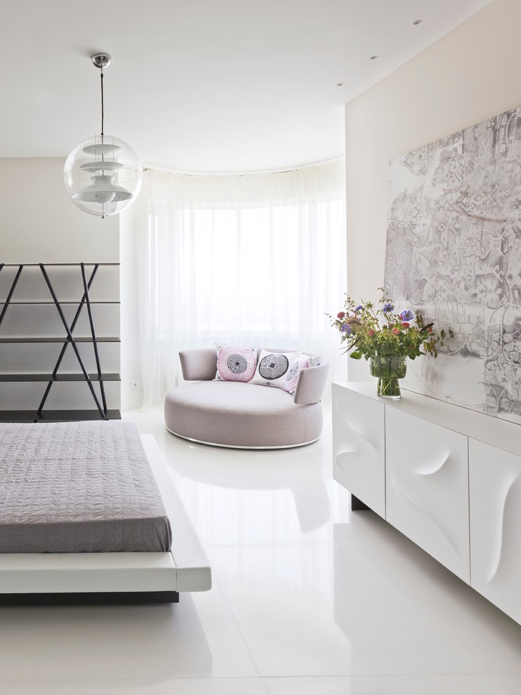 Example of a large trendy master bedroom design in Moscow with white walls and no fireplace