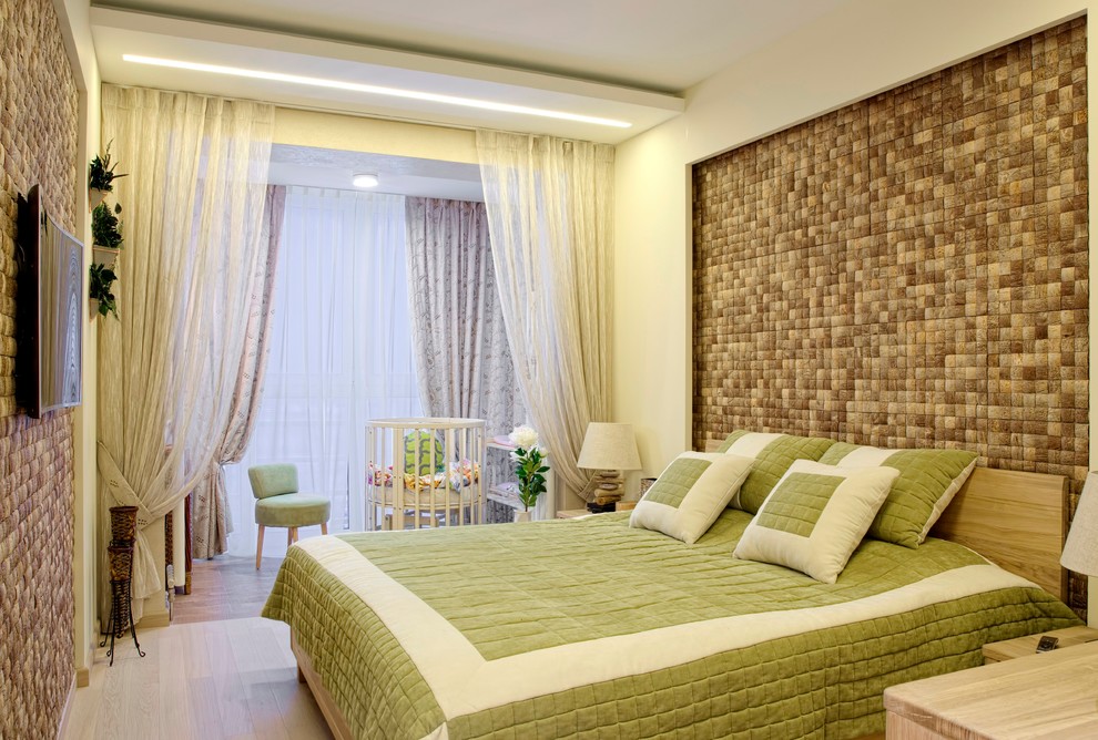 Inspiration for a contemporary master light wood floor bedroom remodel in Moscow with yellow walls