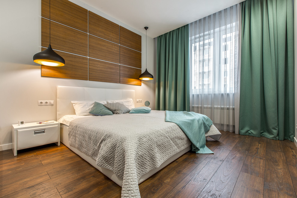Bedroom - contemporary master dark wood floor bedroom idea in Other with white walls